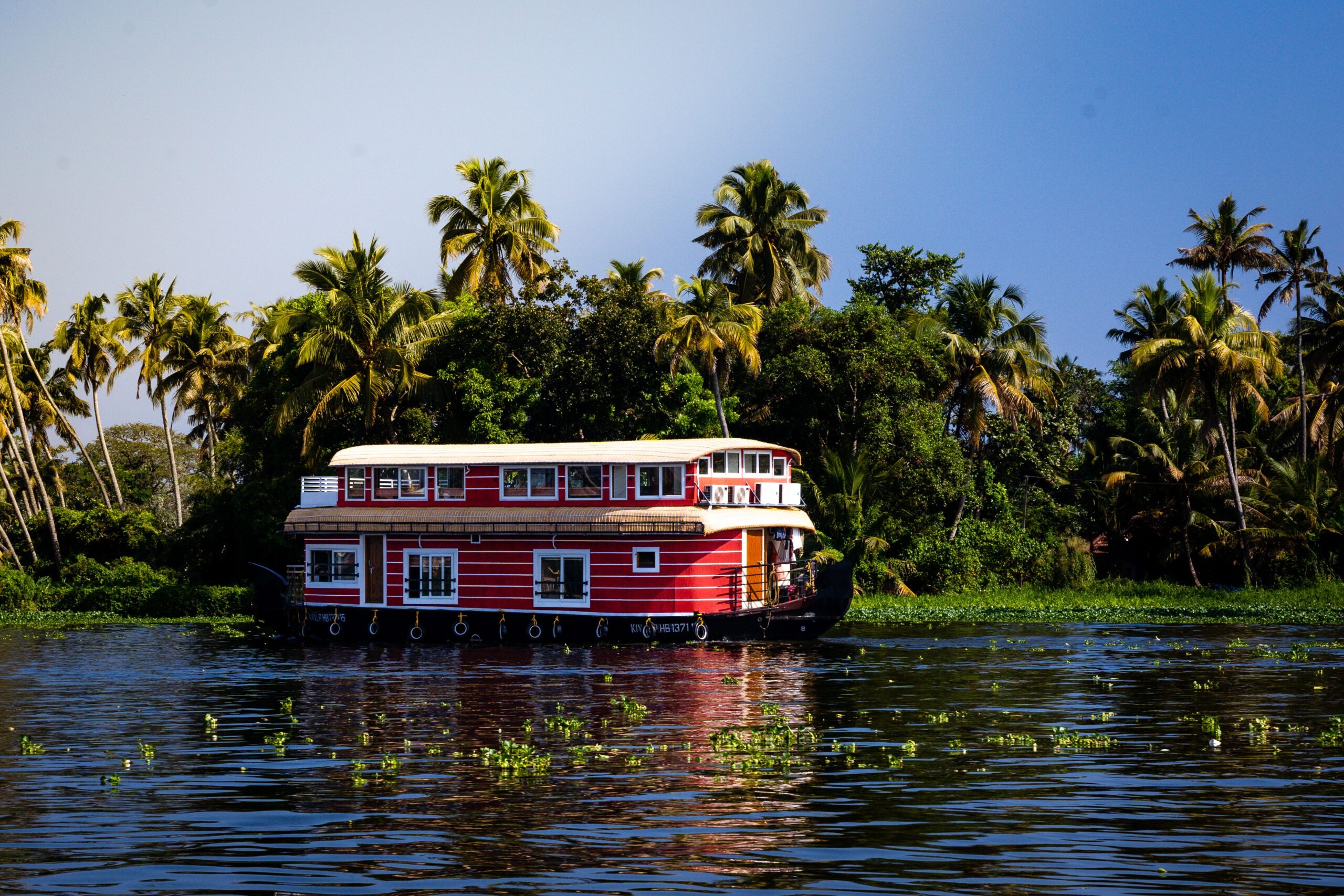 traditional houseboat at a waterfront resort