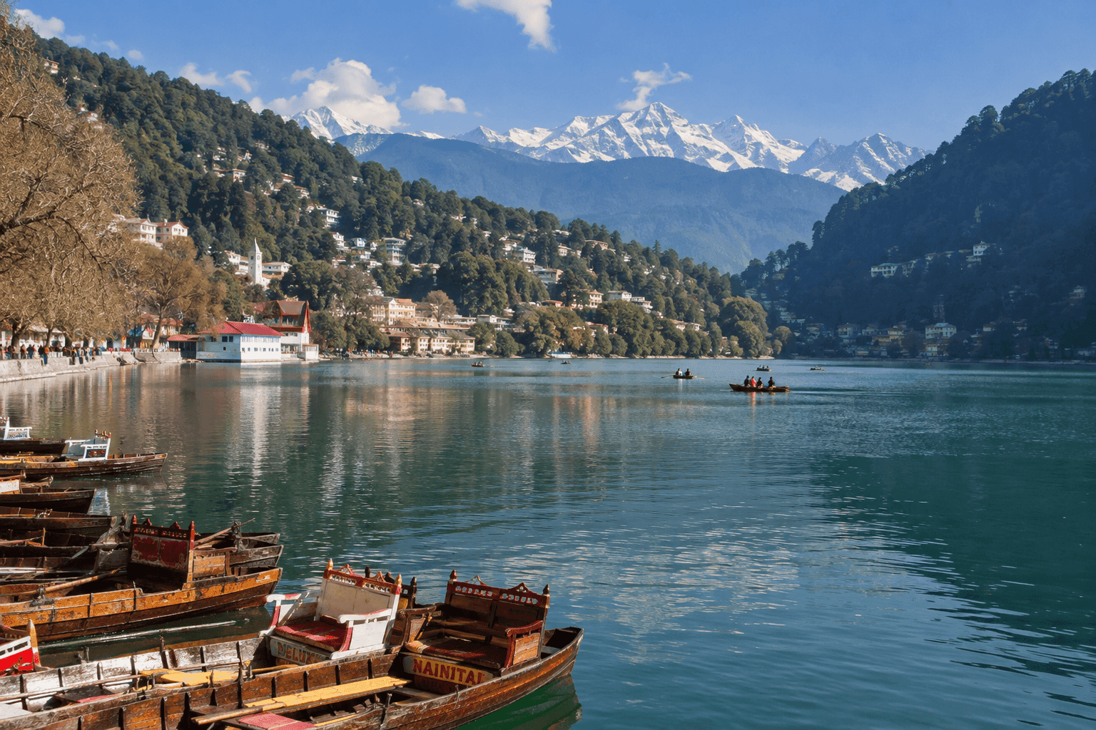 Naini Lake in Nainital surrounded by green hills and boating views